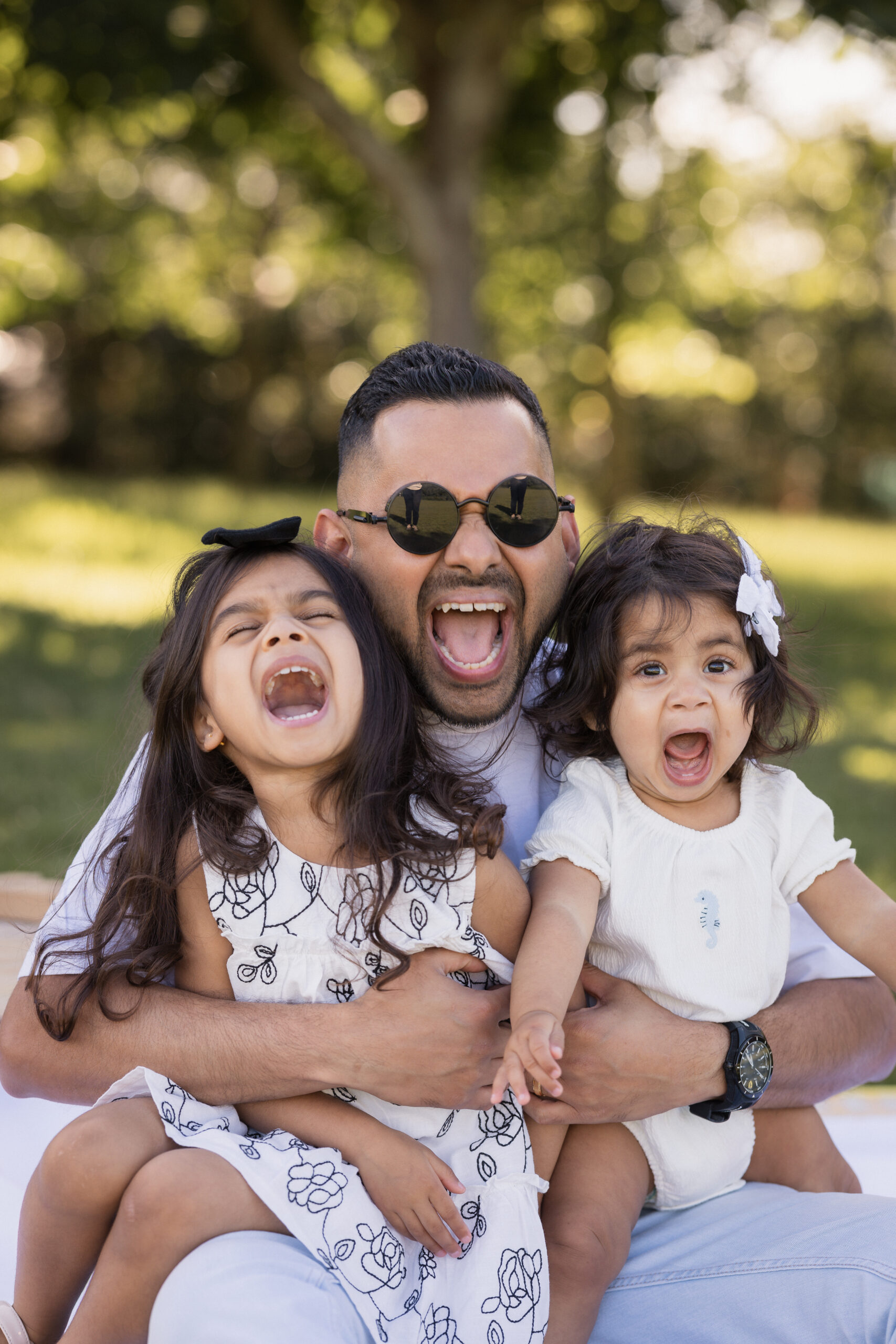 Parents and children laughing during family shoot